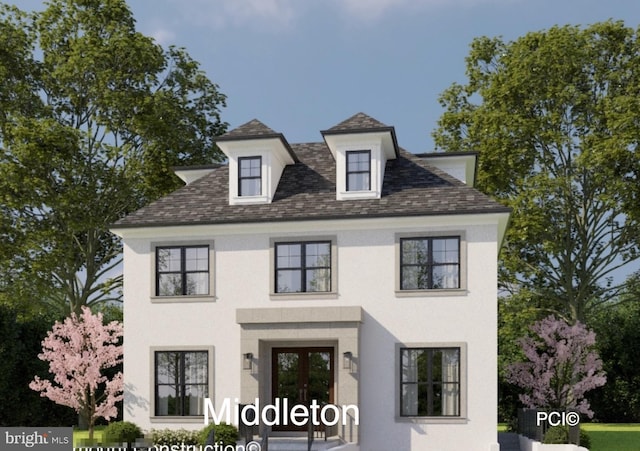 view of front of home featuring french doors, roof with shingles, and stucco siding