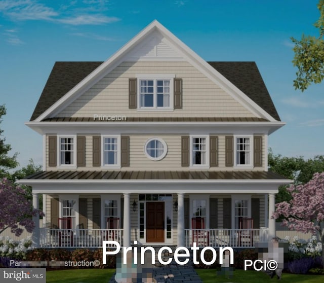 view of front of home featuring metal roof, a porch, and a standing seam roof