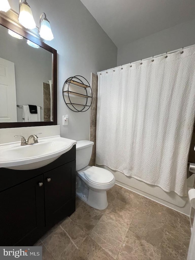 full bathroom with vanity, toilet, and shower / bathtub combination with curtain