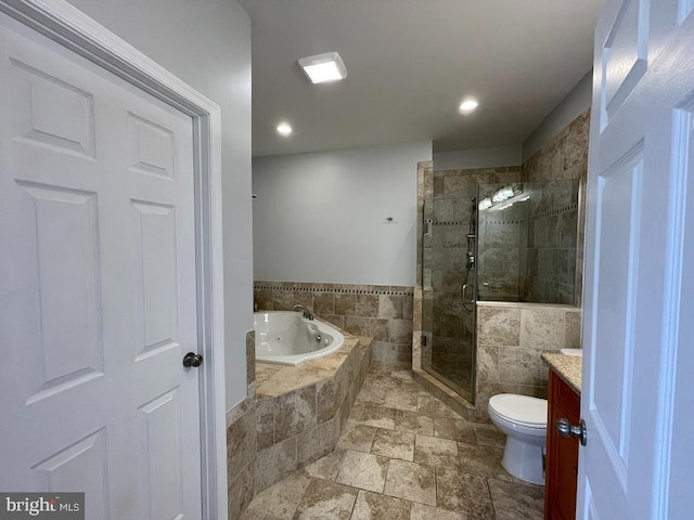 full bathroom with vanity, toilet, and independent shower and bath