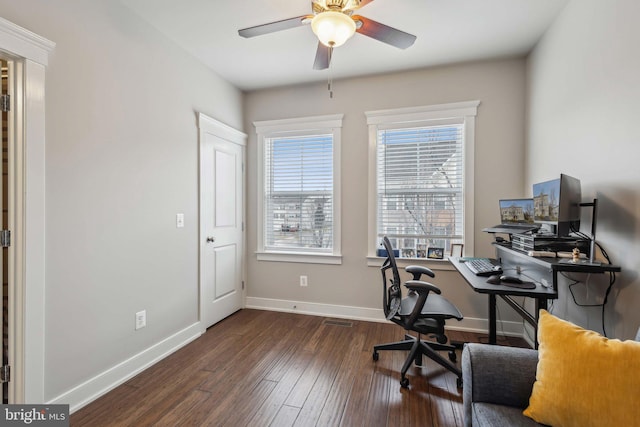 office with dark hardwood / wood-style floors and ceiling fan