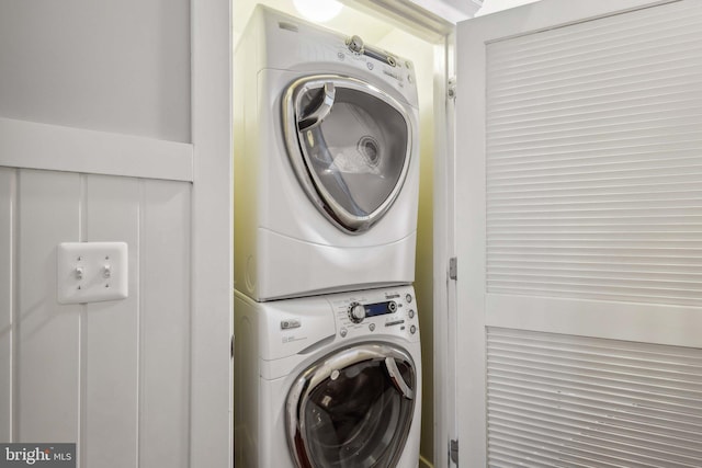 laundry room featuring stacked washer / dryer