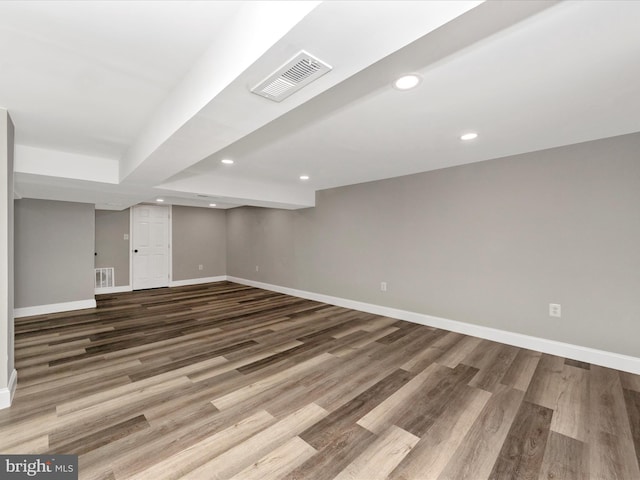 basement with wood-type flooring