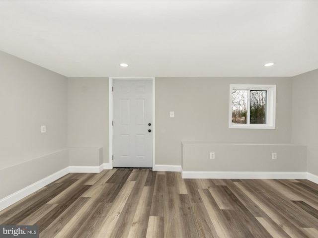 foyer entrance with dark hardwood / wood-style flooring