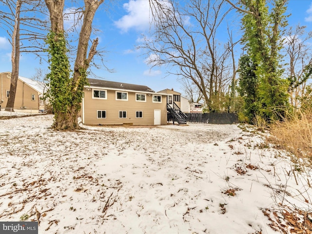 view of snow covered property