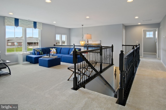 living room with light colored carpet