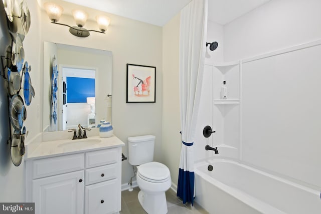 full bathroom featuring toilet, vanity, and shower / tub combo