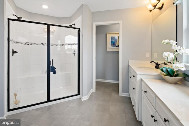 bathroom with an enclosed shower and vanity