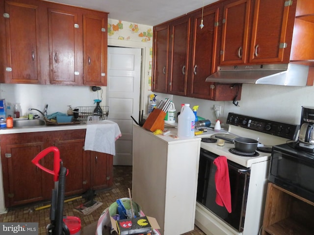 kitchen with sink and electric range