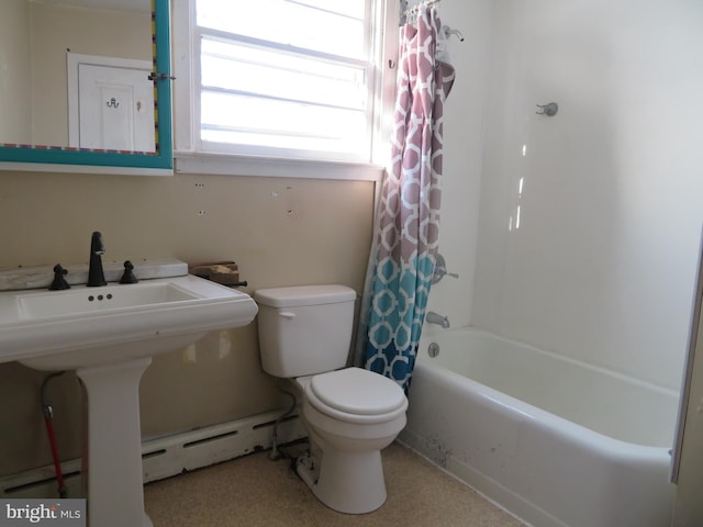 bathroom with toilet and shower / tub combo