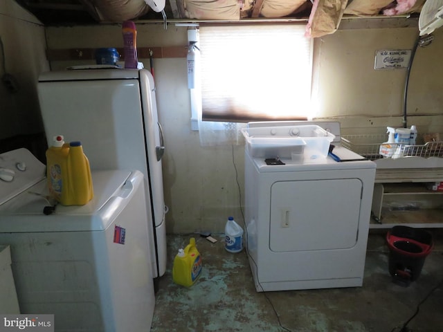 laundry area with washer and clothes dryer