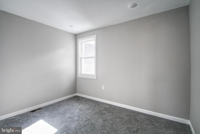 empty room featuring carpet floors