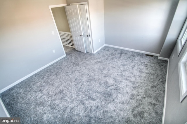 unfurnished bedroom featuring carpet floors