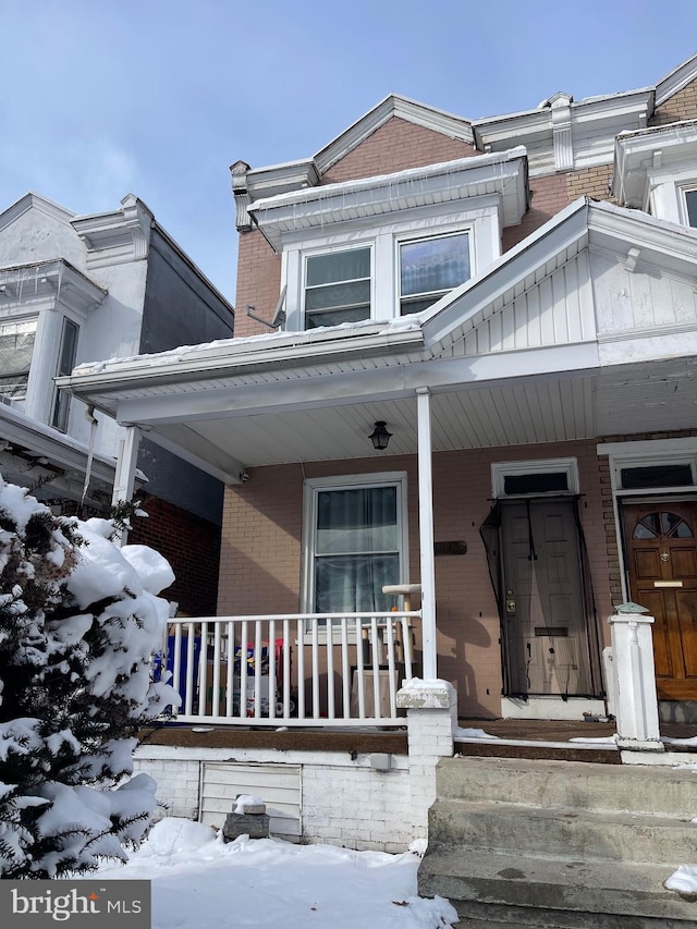 view of front of home featuring covered porch