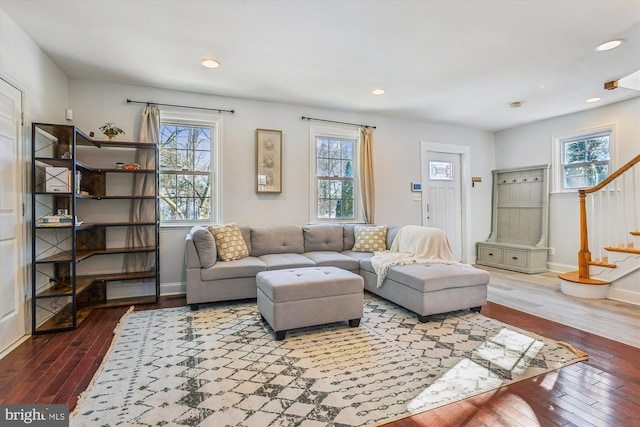 living room featuring plenty of natural light and hardwood / wood-style floors