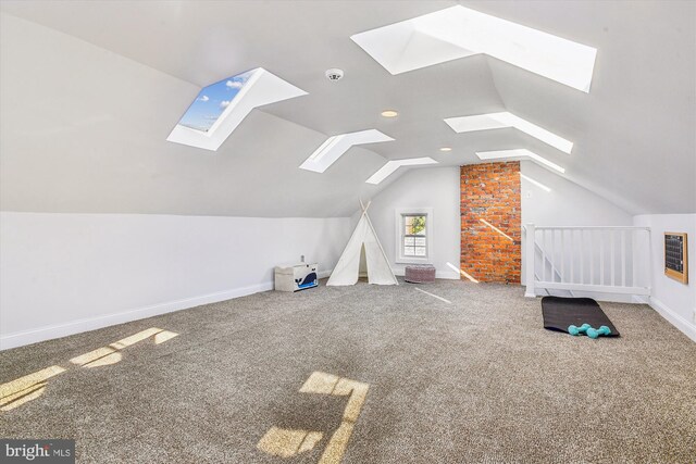 additional living space with lofted ceiling and carpet floors