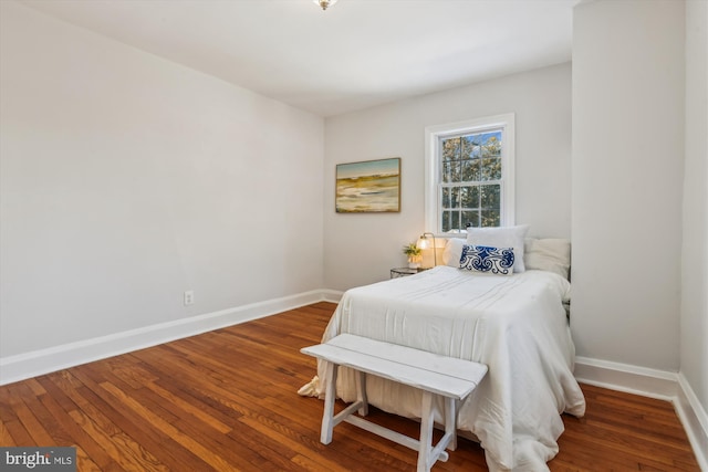 bedroom featuring wood-type flooring