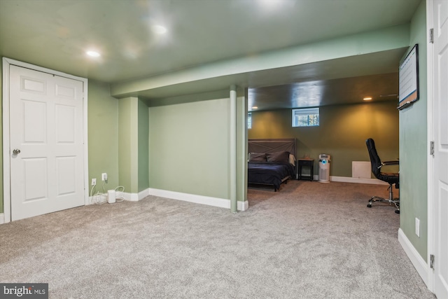 basement with carpet flooring