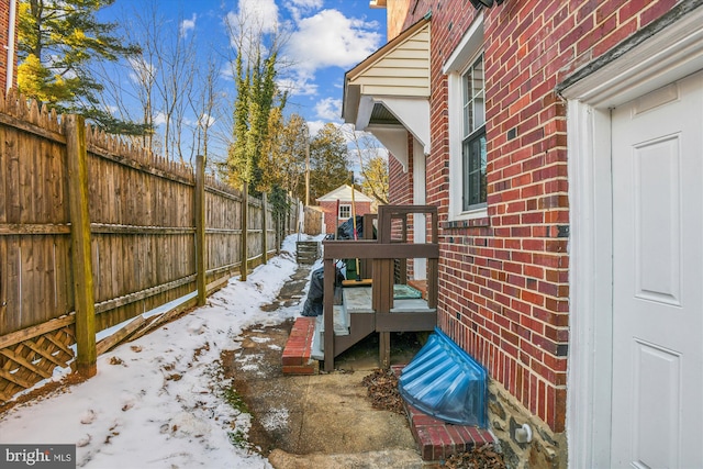 view of yard covered in snow