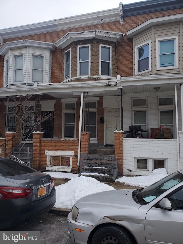 view of property with a porch