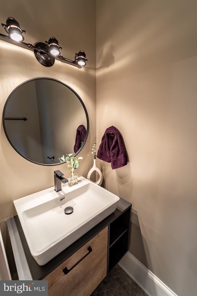 bathroom featuring tile patterned floors and vanity