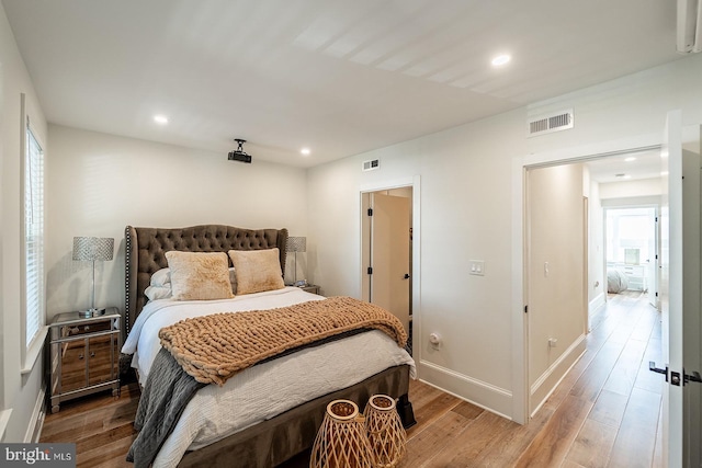 bedroom featuring wood-type flooring