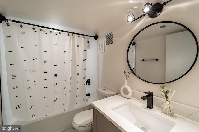 full bathroom featuring toilet, vanity, and shower / bath combo with shower curtain