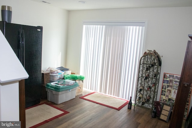 miscellaneous room featuring wood-type flooring