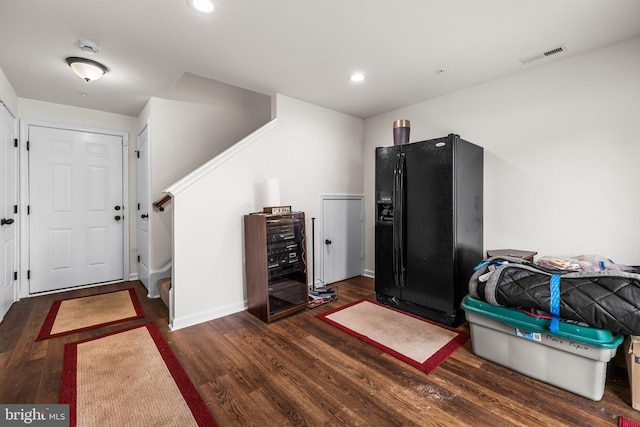 entrance foyer with dark hardwood / wood-style flooring