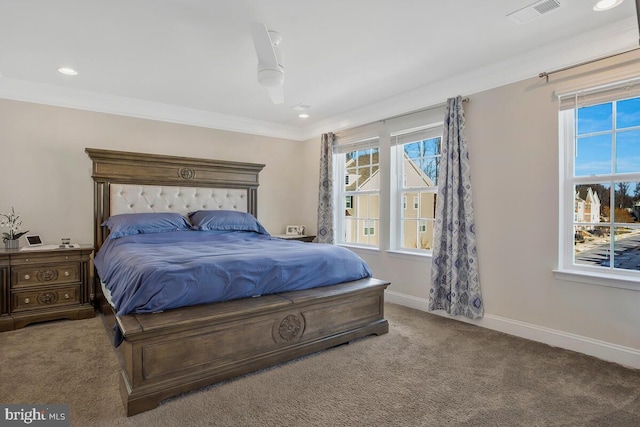 bedroom with ornamental molding, carpet floors, and ceiling fan