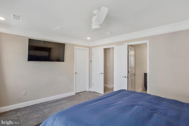 carpeted bedroom featuring ornamental molding and ceiling fan