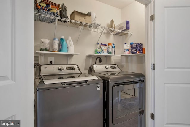 laundry room with washer and dryer