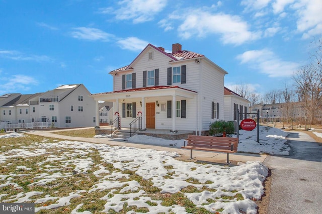 view of front of house with covered porch