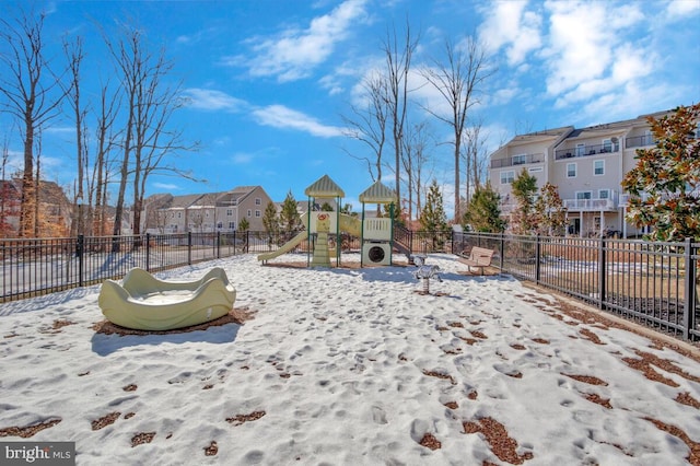 snow covered playground featuring ac unit