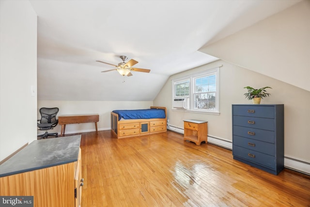 bedroom featuring baseboard heating, vaulted ceiling, ceiling fan, light wood-type flooring, and cooling unit