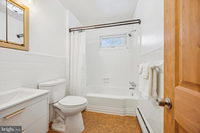 full bathroom with shower / bath combo with shower curtain, toilet, vanity, and tile walls