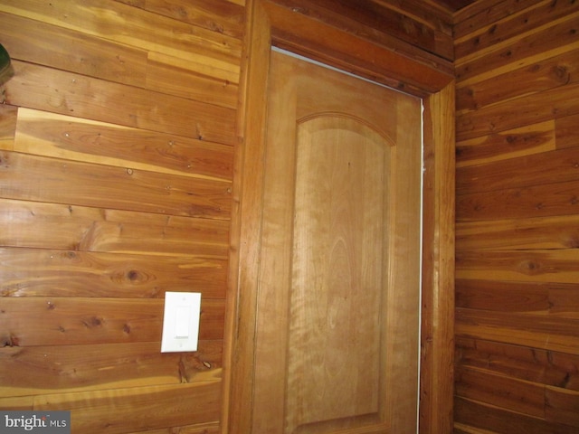 interior details featuring wood walls