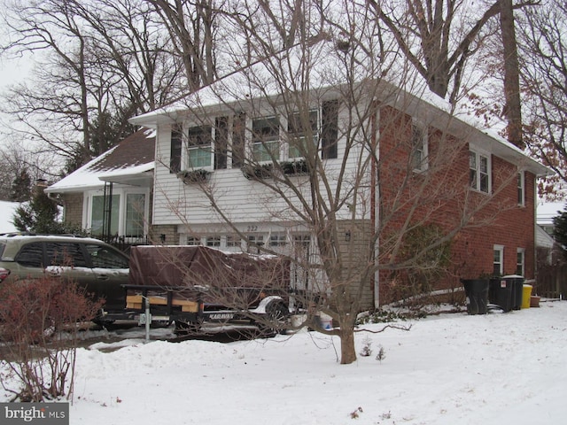 view of snow covered property