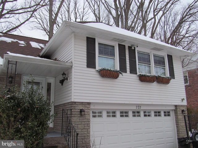 view of home's exterior featuring a garage