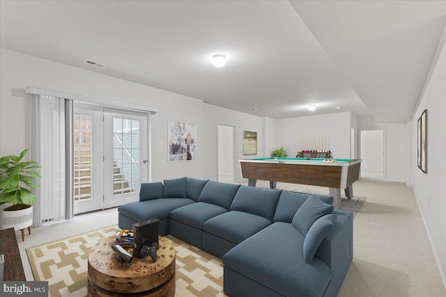 living room featuring light colored carpet and billiards