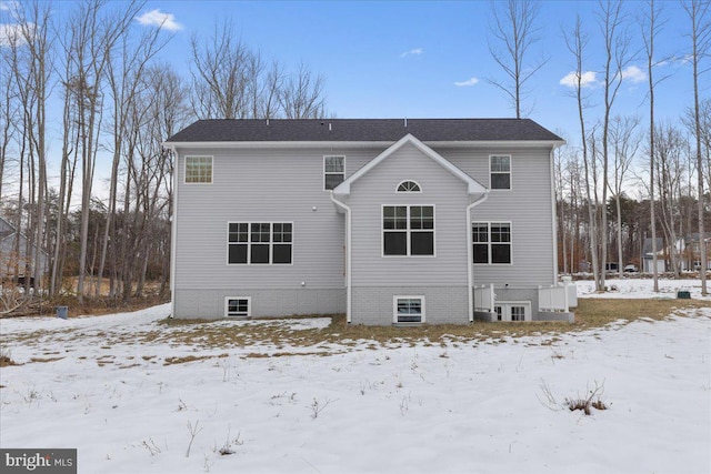 view of snow covered house