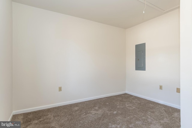 unfurnished room with carpet floors and electric panel