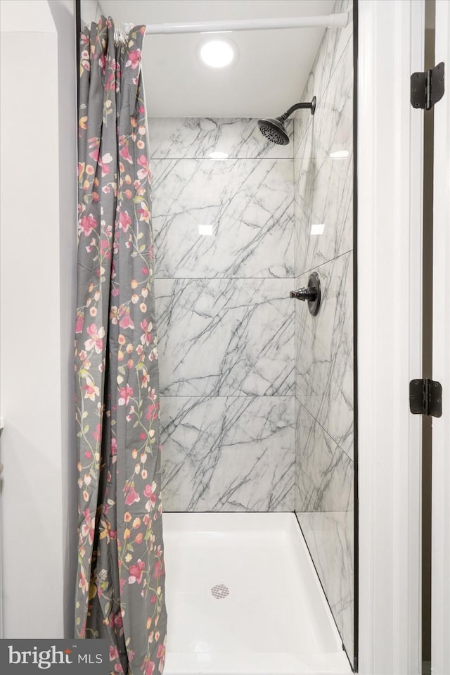 bathroom with walk in shower