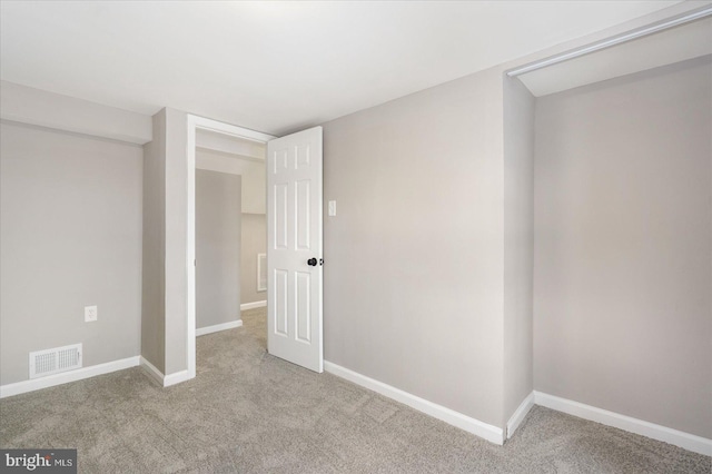 basement with light colored carpet