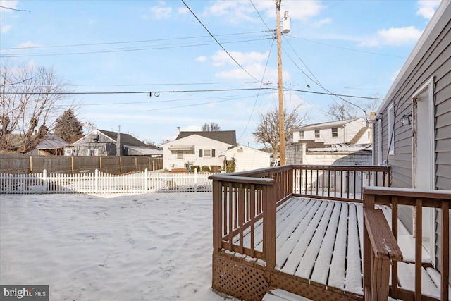 view of snow covered deck