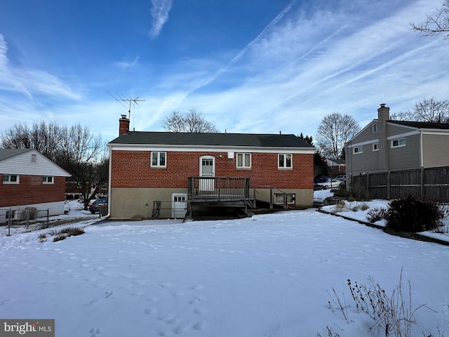 view of snow covered house