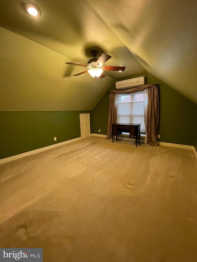 additional living space featuring vaulted ceiling, an AC wall unit, and carpet flooring