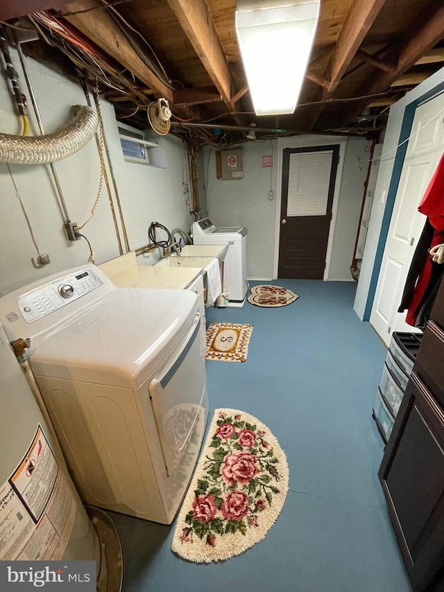 laundry room featuring separate washer and dryer