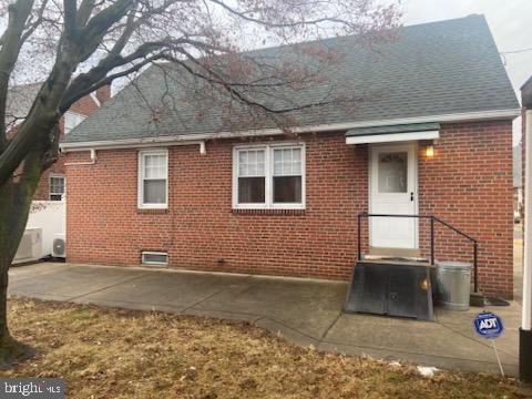 rear view of property with a patio