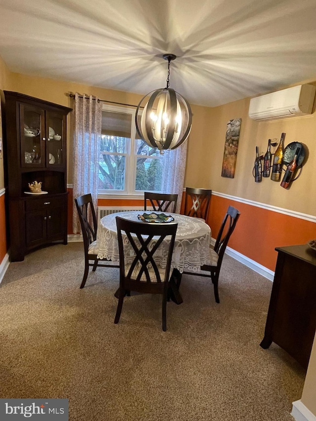 dining space featuring an AC wall unit, carpet floors, and an inviting chandelier